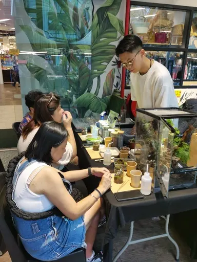 Guests working at a tall table