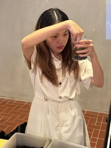 Holding up a finished terrarium