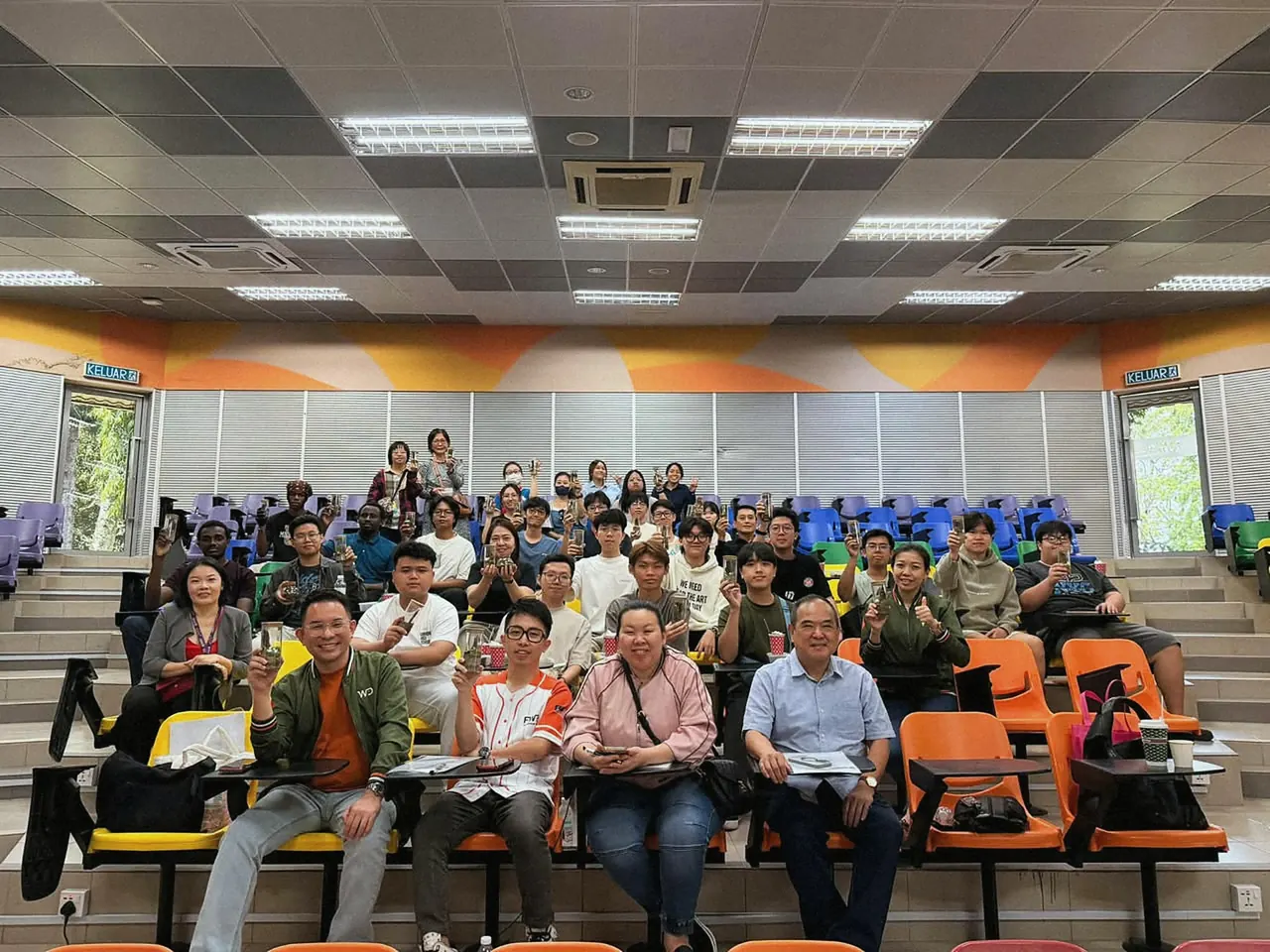 A full lecture hall at a school talk